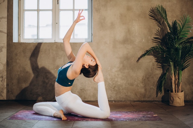Online Yoga Teacher Doing Poses